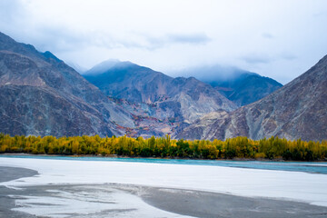 Beautiful autumn landscape with colorful trees in the mountains valley of skardu, gilgit baltistan, Pakistan