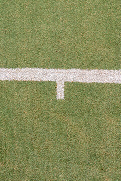 Cancha de tenis con pasto artificial