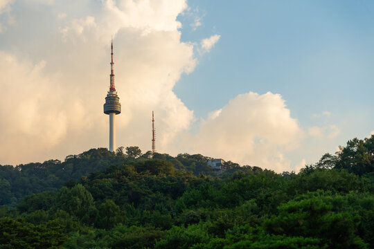 View of Namsan Tower on a Sunny Day With Scattered Clouds