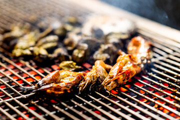 A grill with food cooking on it