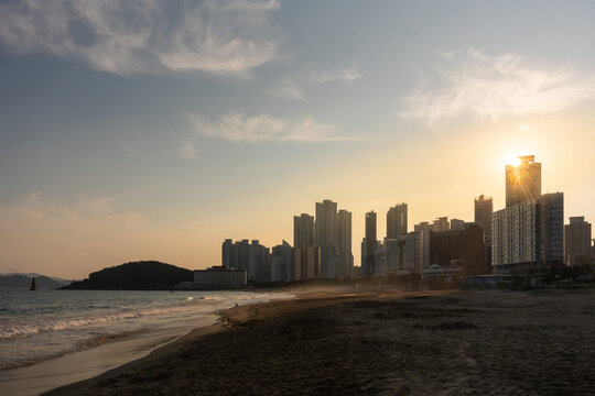 Sunset Over City Skyline at the Beach in Busan, South Korea