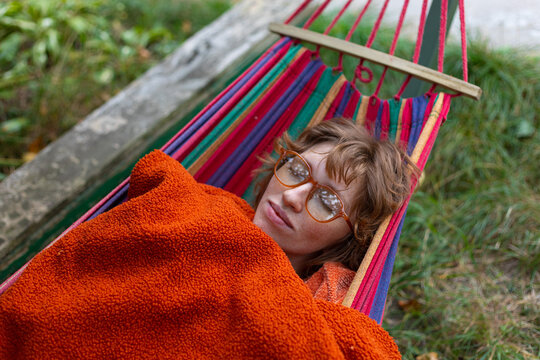 a girl dozing in a hammock