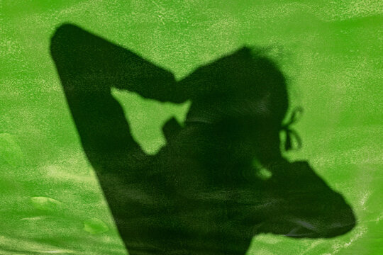 Reflected shadow on green paintwork
