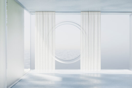 White modern ocean room with sheer curtains and round window