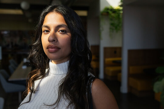 Portrait of a woman in natural light, showcasing professionalism