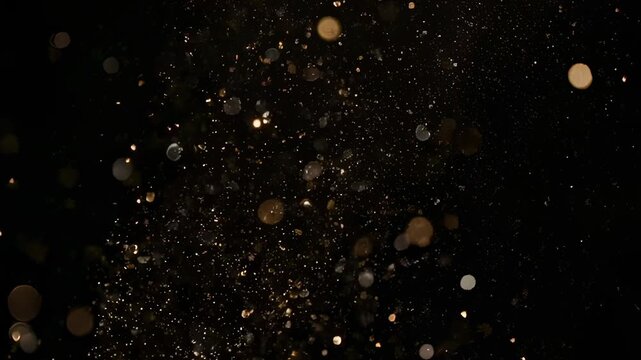 Bokeh lights scatter across a dark, undefined background