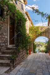Cozy street of an old European town with historic buildings