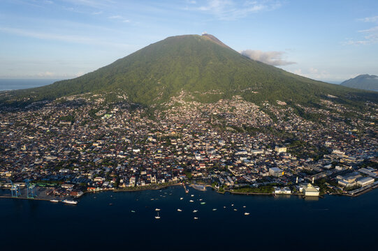 Cityscape of Ternate with volcanic mountain