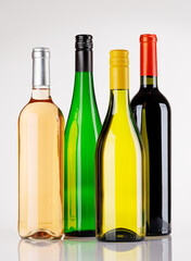 Fototapeta premium Different wine bottles on white background