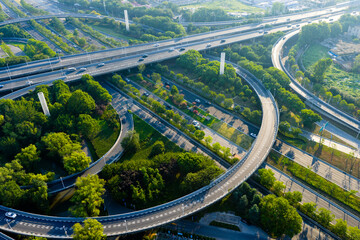 Aerial view of urban highway interchange with traffic