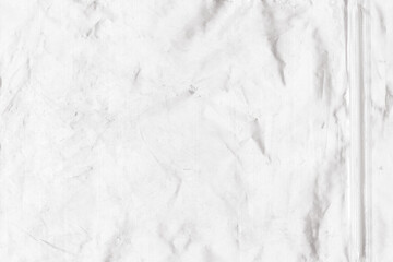Subtle textured light grey backdrop with soft gradient effect