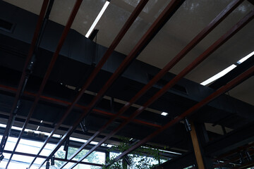 Interior architecture and design of modern style ceiling decorated with lamp and wooden panels