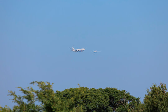 The Wings of a Blue Sky: A Moment on an Air Route.