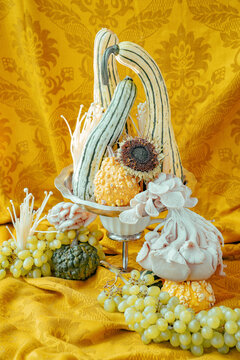 Colorful display of unique gourds and fruits