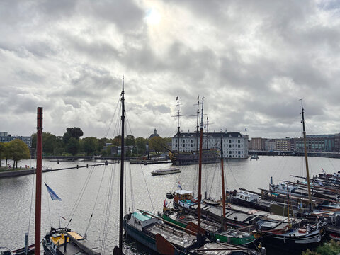 historic barges in amsterdam harbour