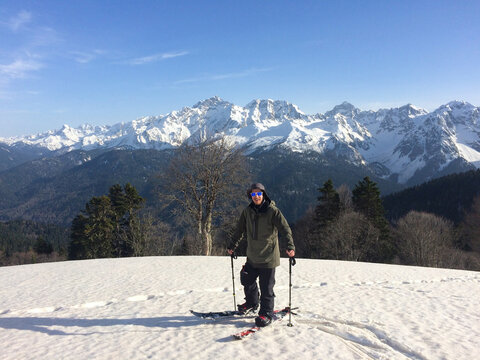 Splitboard touring with skins in alpine terrain
