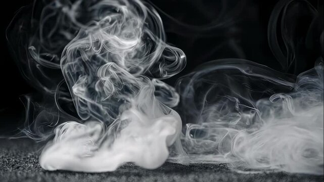 Ethereal smoke plumes dance on dark, textured surface