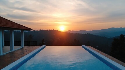 Fototapeta premium Wellness fitness holistic concept. A serene sunset view over a hillside pool.