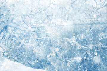 Snowy winter background in the park, blurred abstract seasonal backdrop, snowflake texture, light landscape background