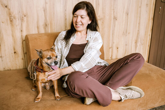 A woman enjoys time spent with her dog