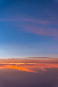 Beautiful Sunset Over Clouds at Twilight in a Clear Sky