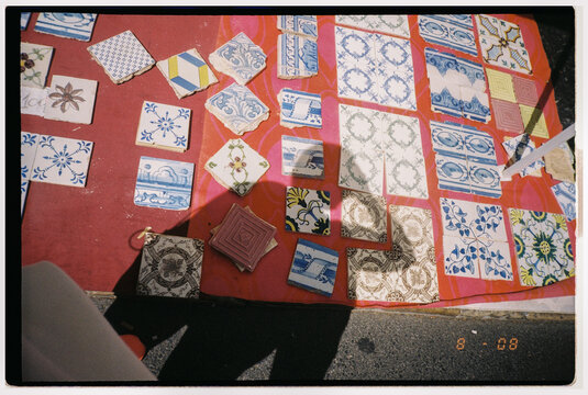 Shadow on Colorful Tiles at Market