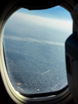 Scenic View of Seoul City From an Airplane Window During Daytime
