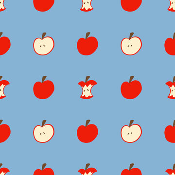 A red apple pattern on a blue wallpaper