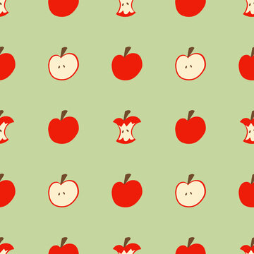 A red apple pattern on a green wallpaper