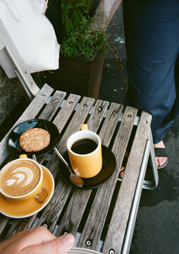 Coffee and Dessert Break at a Cozy Outdoor Cafe