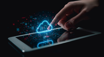 Naklejka premium A hand interacting with a glowing cloud icon on a tablet, symbolizing cloud computing, data transfer, and digital innovation.