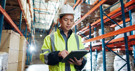 Tablet, shipping and Asian man in warehouse for distribution, supply chain or check stock. Technology, logistics worker and person with inventory management for cargo, storage and quality control