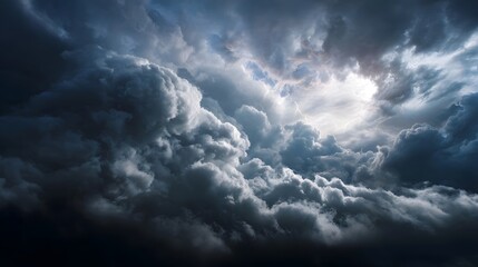 Obraz premium Dramatic storm clouds illuminated by lightning streaks against a dark sky