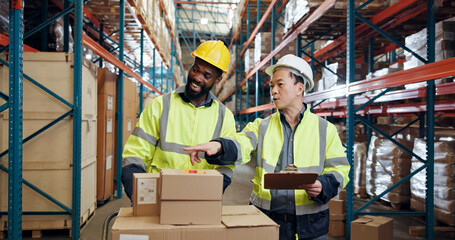 Shipping, team and people in warehouse with clipboard for distribution, inventory and inspection. Talking, storage depot and man with woman with checklist for logistics, production and supply chain