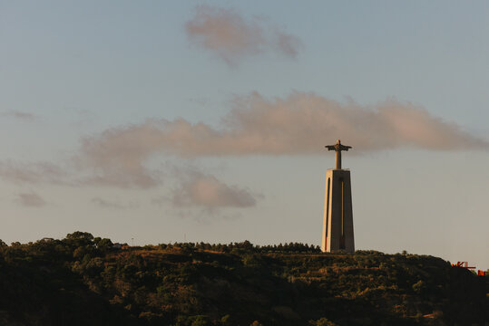 Cristo Rei statue at sunset in Lisbon