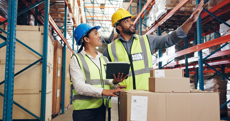 Supply chain, pointing and people in warehouse on tablet for distribution, inventory or order inspection. Meeting, storage depot and man with woman on digital tech for logistics, shipping or delivery