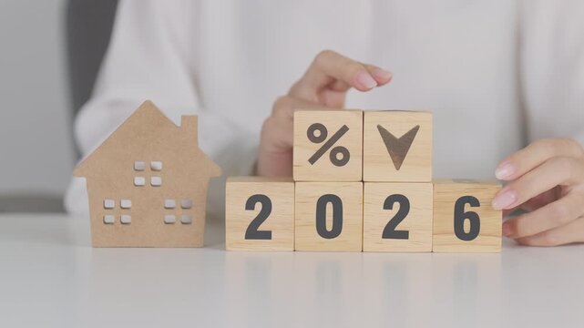 2026 New Year with percentage change to UP and Down arrow with Home model. Real estate Mortgage, Refinance, House loan and debt, Interest rate, Insurance, Financial and Property Tax