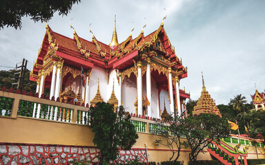 Suwankeereewong Temple wat golden Buddhist palace building Patong Phuket Thailand.