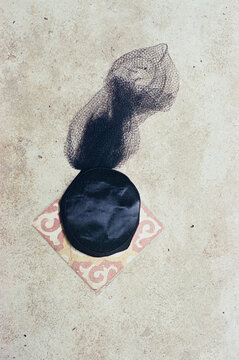 Black vintage hat composition still life