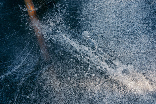 Abstract ice background with bubbles surfacing