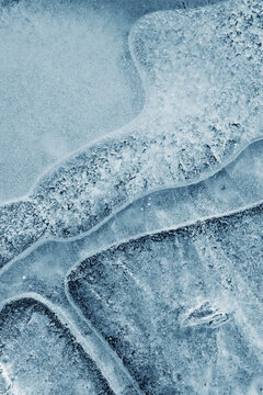 Abstract ice textures on a frozen surface