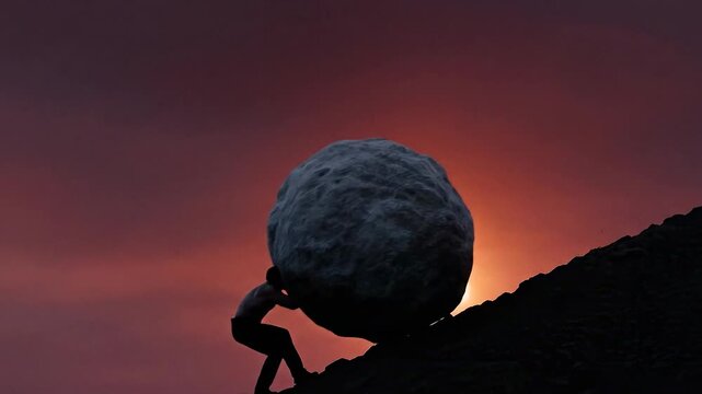 A person struggles to push a large boulder uphill as the sun sets in the background. The silhouette highlights the effort and determination shown in this challenging activity.