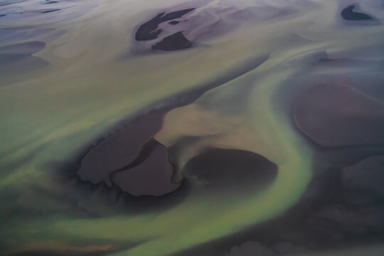 Abstract aerial view of glacial rivers in Iceland
