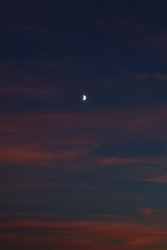 Crescent Moon Shines in a Dusky Evening Sky