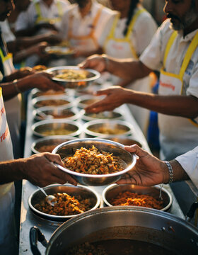 Ultra-clean, authentic shot of multiple faceless volunteers and devotees sharing and serving hot, fresh langar meals into stainless steel bowls, embodying teamwork, community, and selfless service