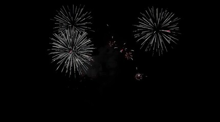 Fototapeta premium Eerie Fireworks in a Jet Black Night Sky with Unsettling Shadows and Dark Tones