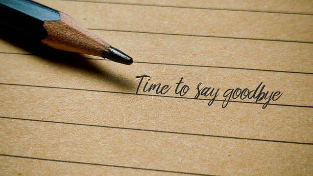 Time to Say Goodbye Message Written on Lined Vintage Paper with Pencil Farewell Concept