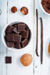 muffin baking ingredients on white wooden table