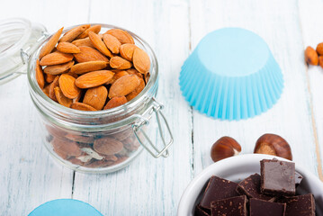 muffin baking ingredients on white wooden table