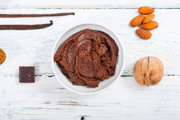 muffin baking ingredients on white wooden table